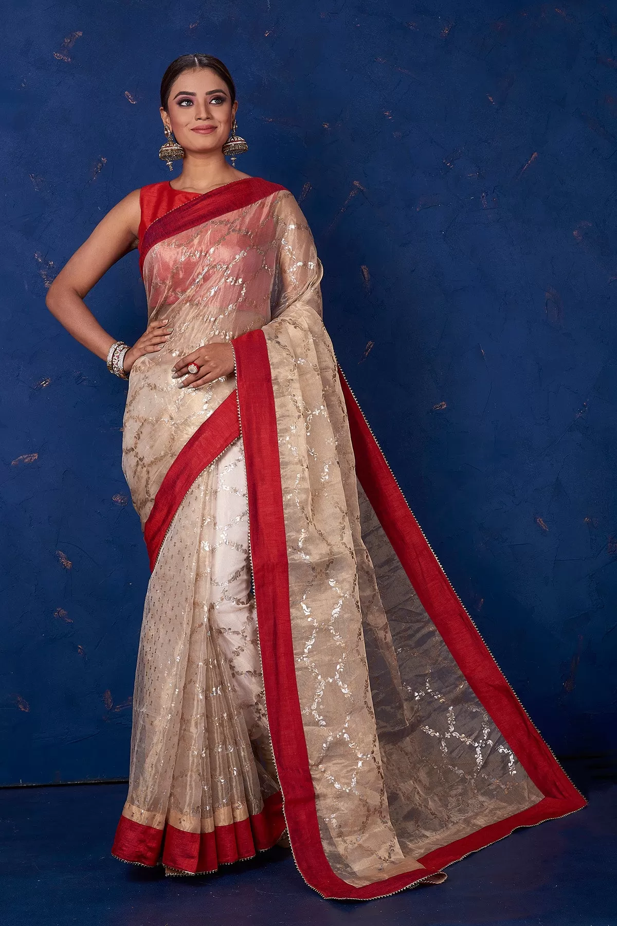 90M161 Beige Foil Print Organza Saree with Red Border