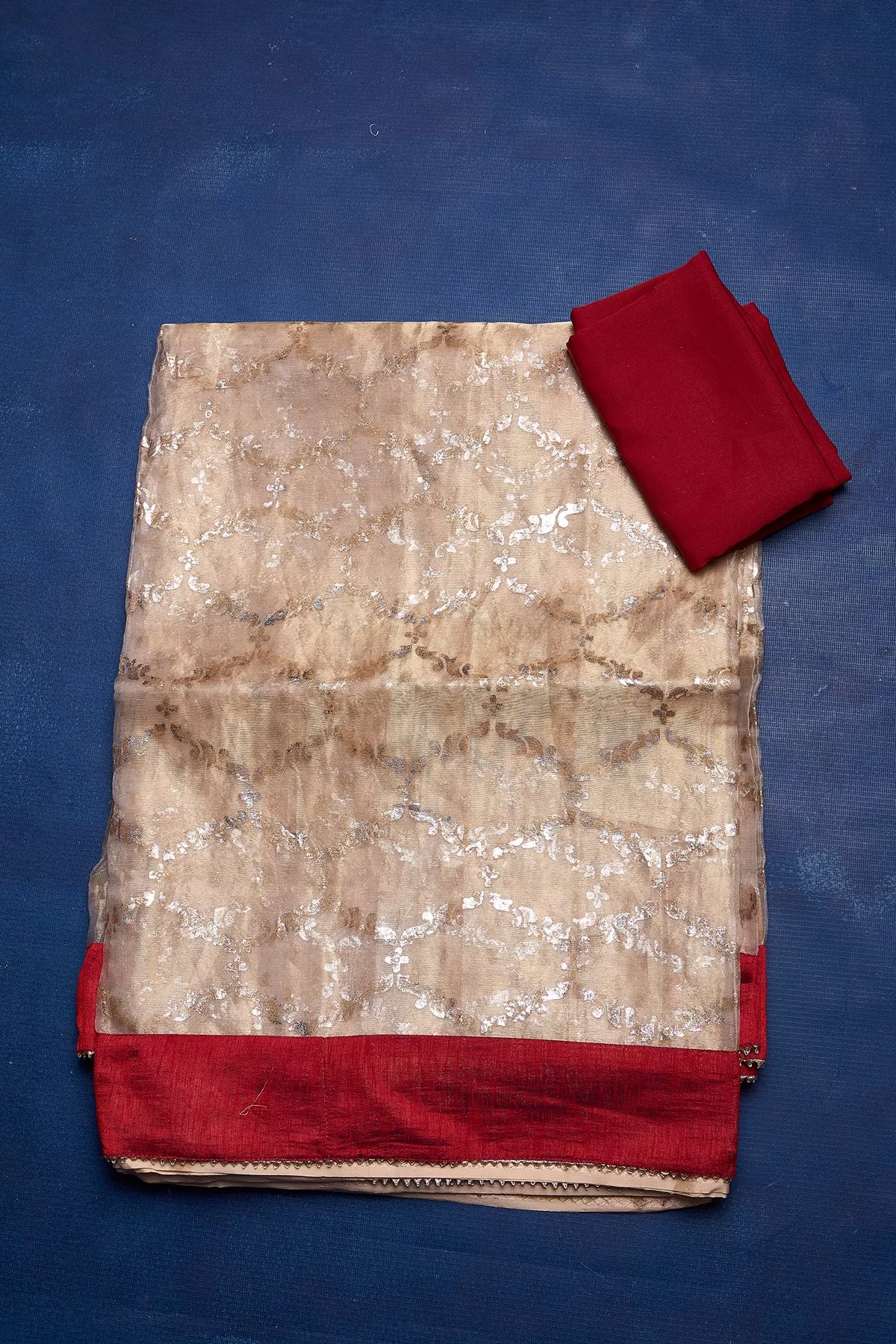 90M161 Beige Foil Print Organza Saree with Red Border