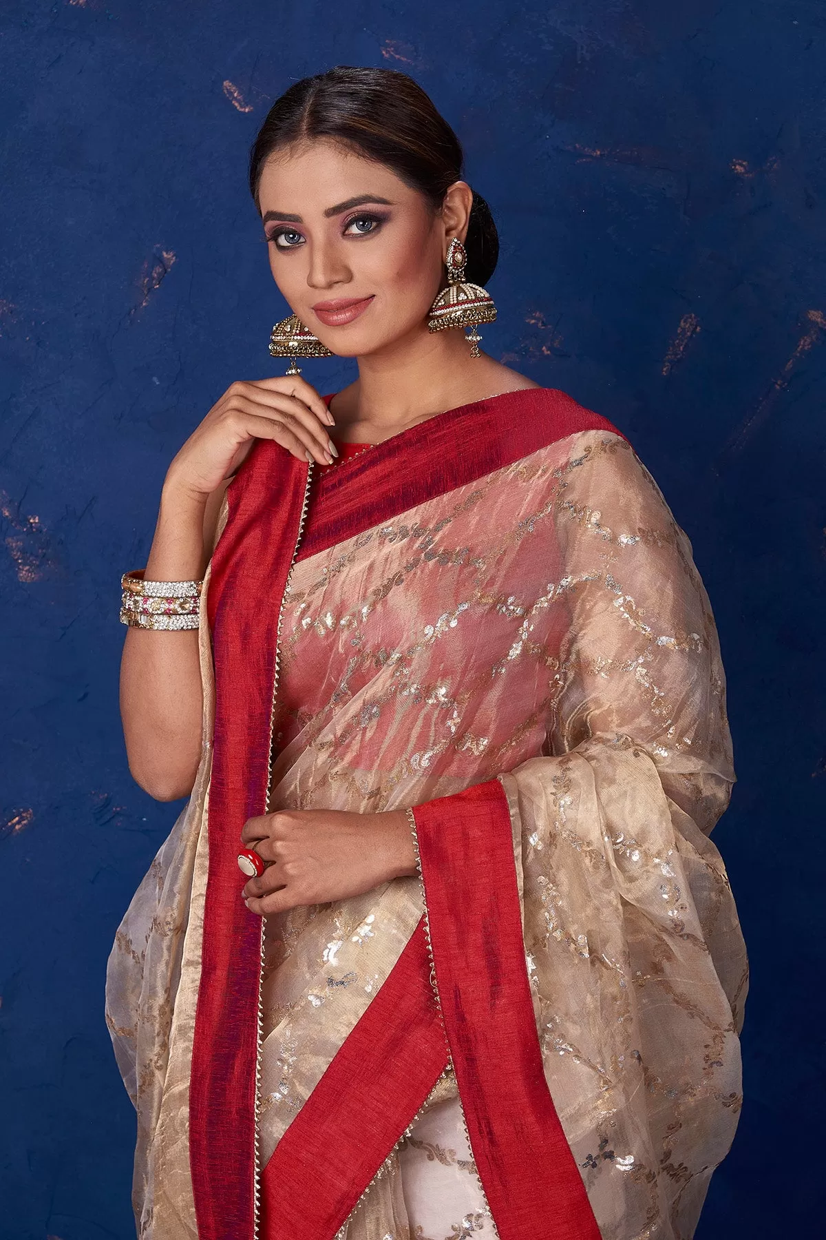 90M161 Beige Foil Print Organza Saree with Red Border