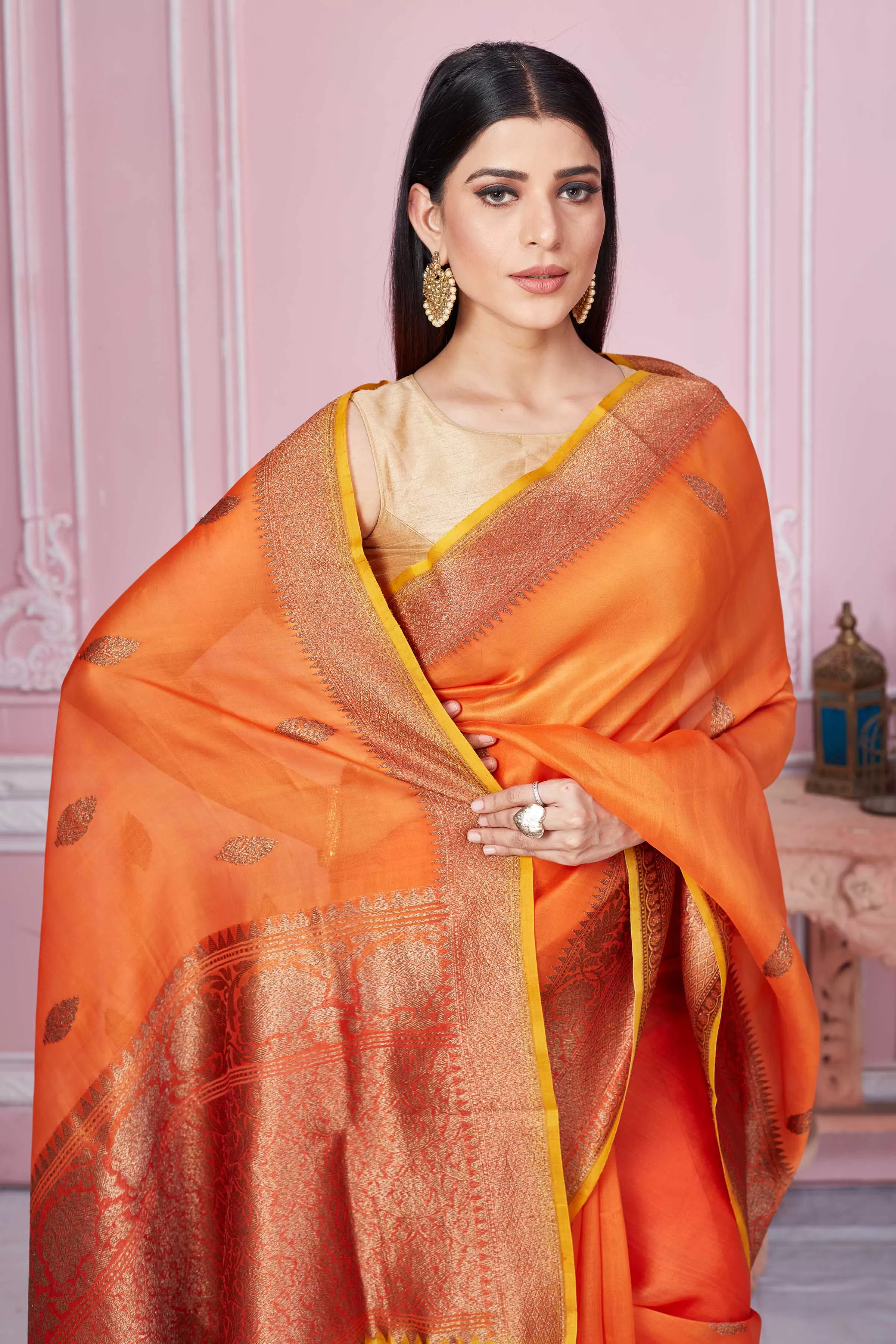 92A234 Orange Banarasi Saree With Red Zari Border