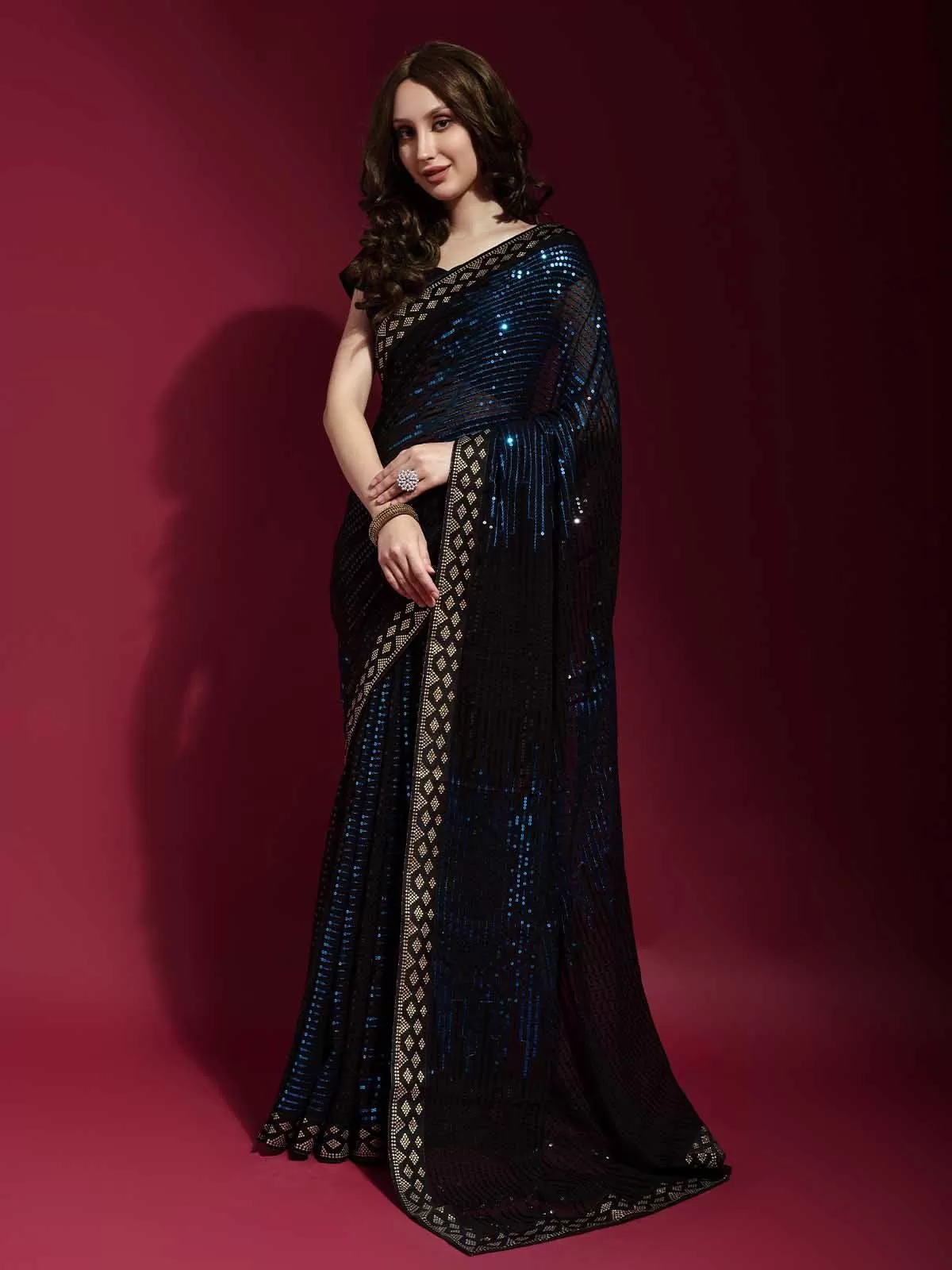 Odette Women Black And Blue Georgette Sequence Saree With Unstitched Blouse