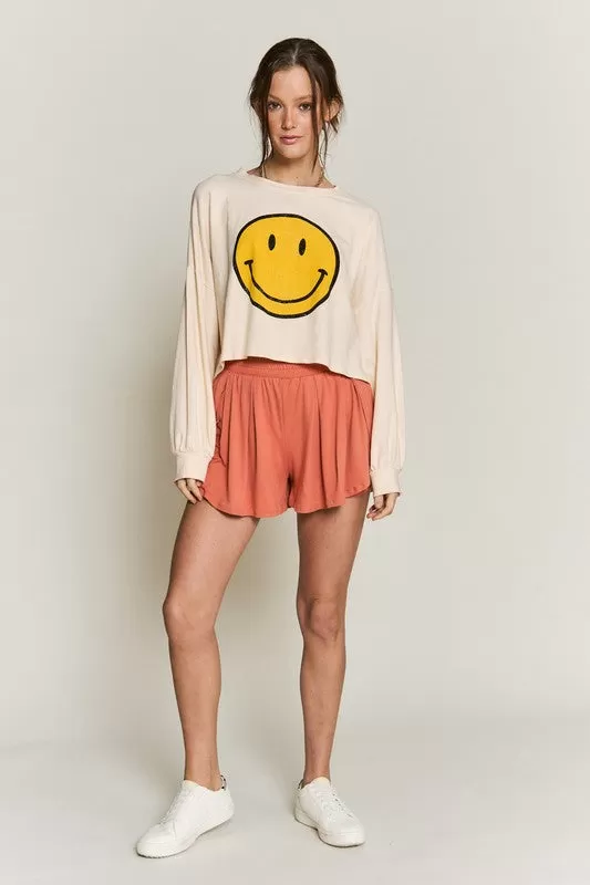 SMILEY FACE LONG SLEEVE CROP TOP