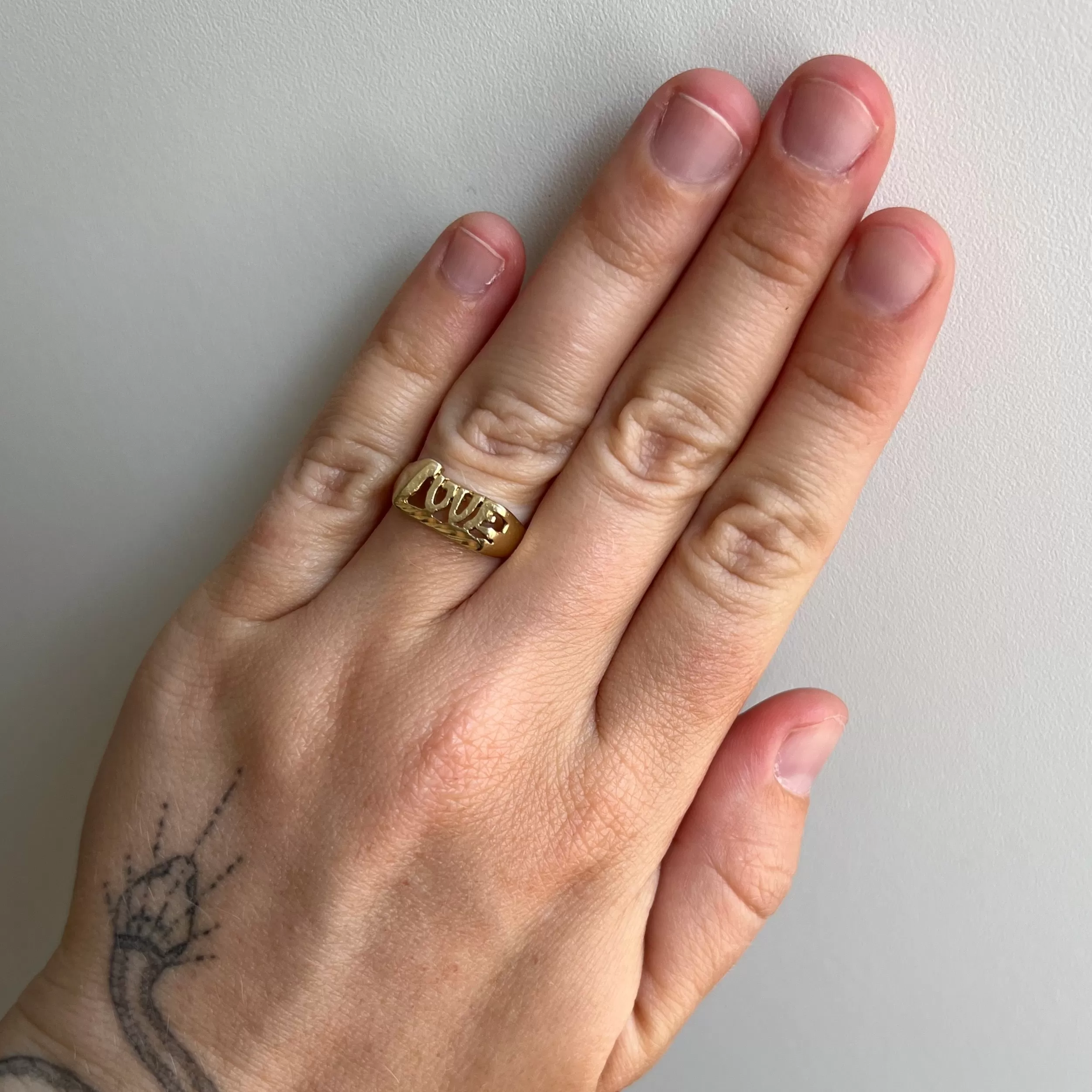 V I N T A G E // wearable LOVE / 14k yellow gold LOVE word ring / size 6.25